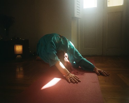 Person practicing light morning stretch